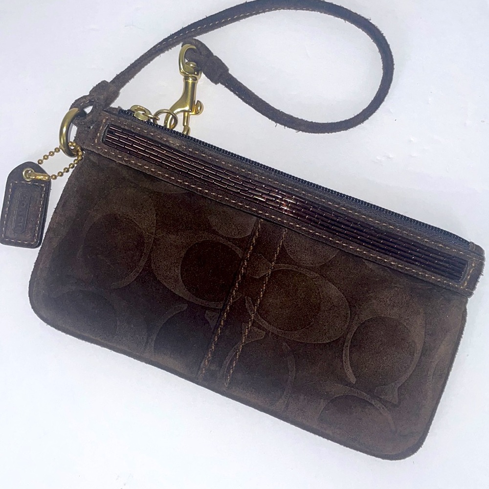 Authentic Coach Brown Suede Wristlet with
Beaded detail!!!